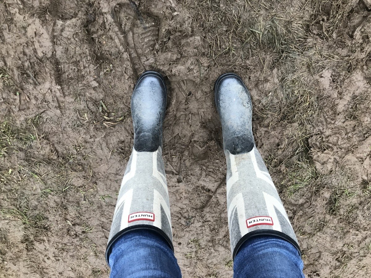 Luxury Guide to Surviving Festivals Hunter wellies in mud at festival