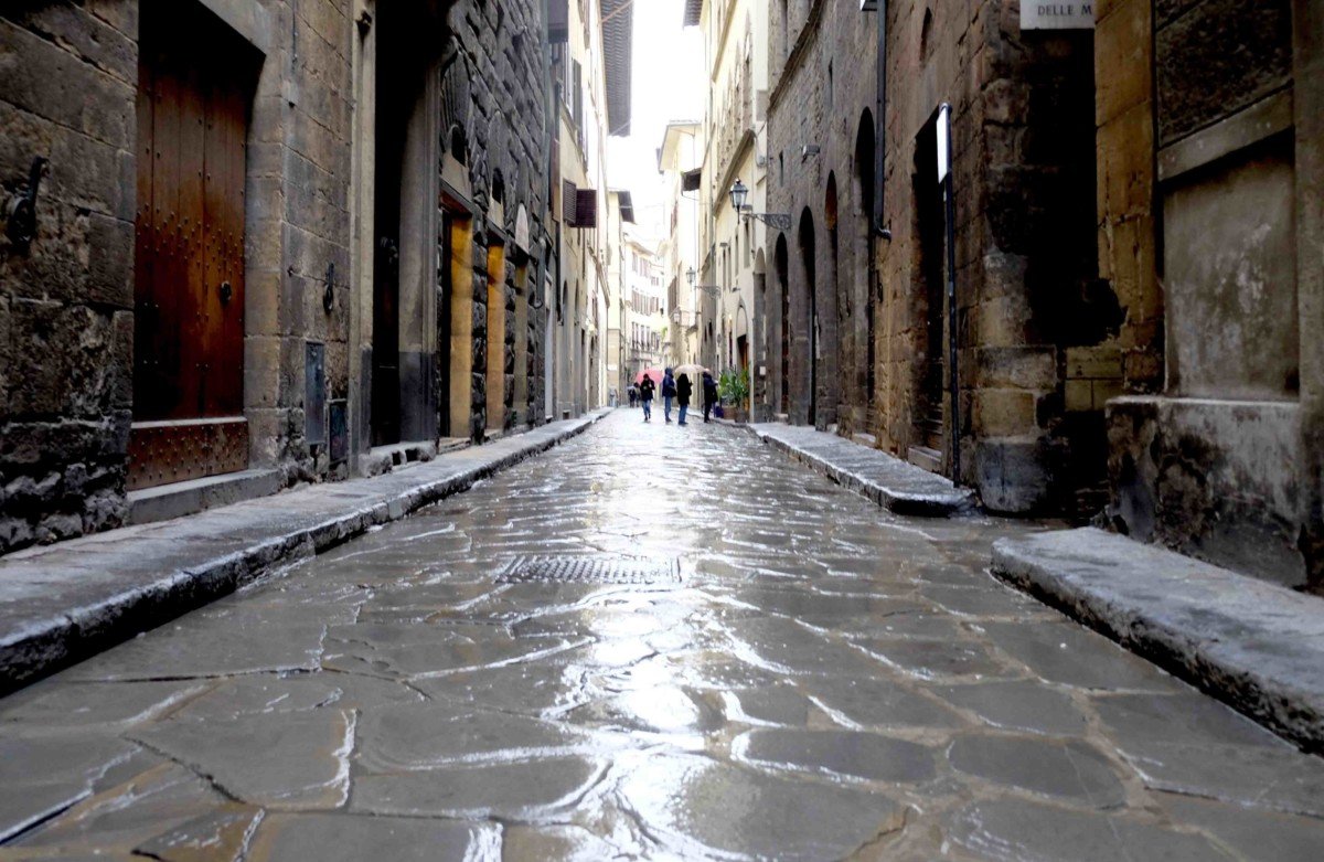 Florence rain reflection on the street Day trip Gelato making in florence with Livitaly