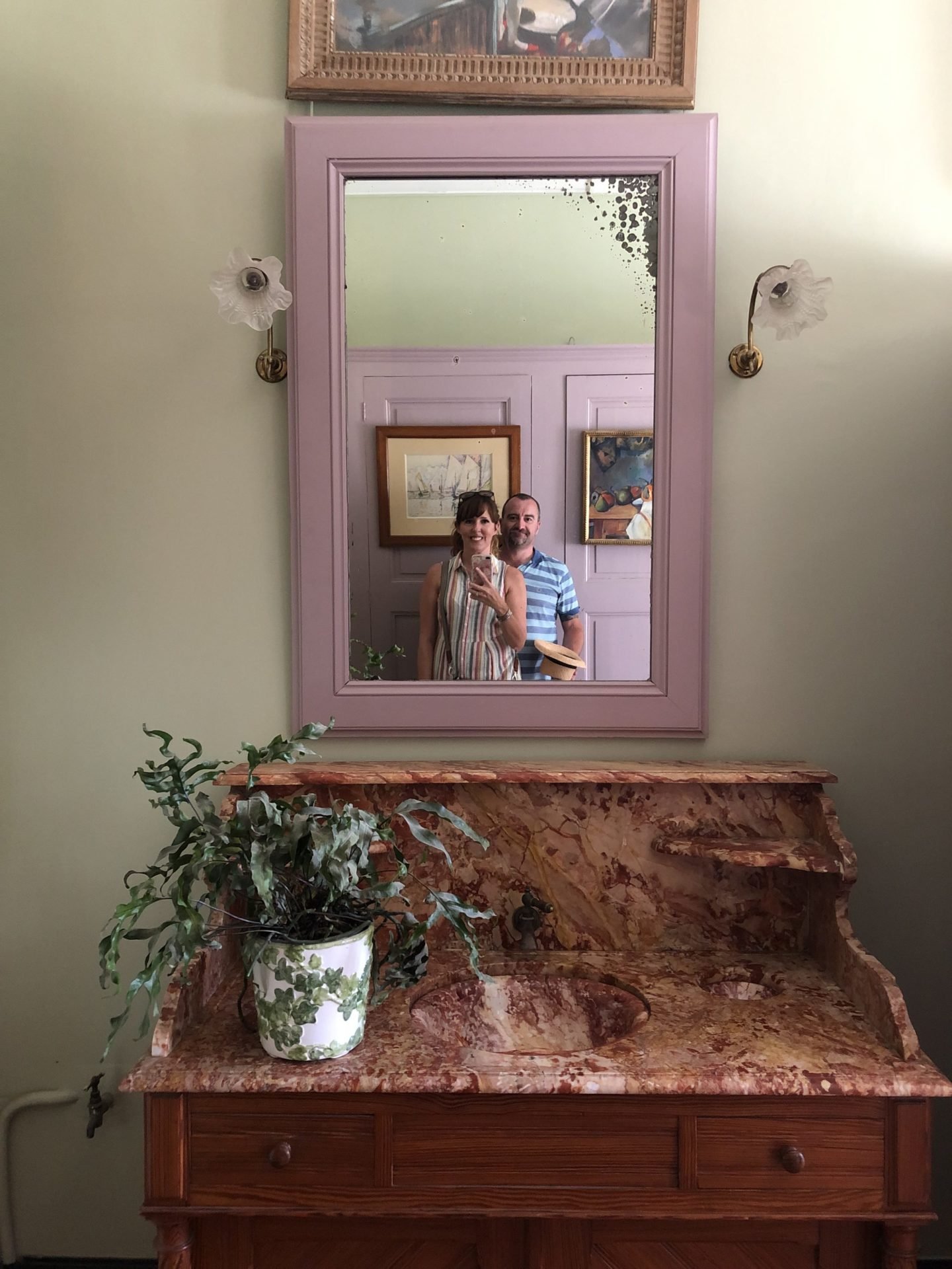 The bathroom dressing rooms of Monets home are towards the centre of the house with ornate washstands. Plenty of mirrors adorn the room with again more windows letting in light. Monet's dressing room was a cool mint
