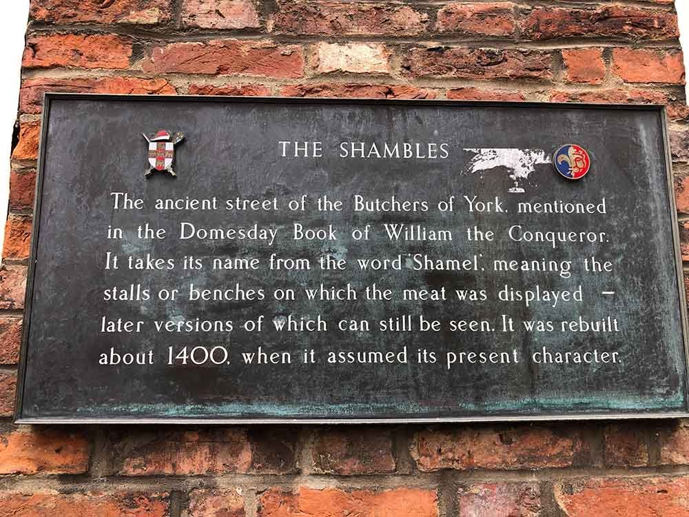 The shambles street sign in York. Shambles stands for "shamel" The Shambles once had many meat market stalls.