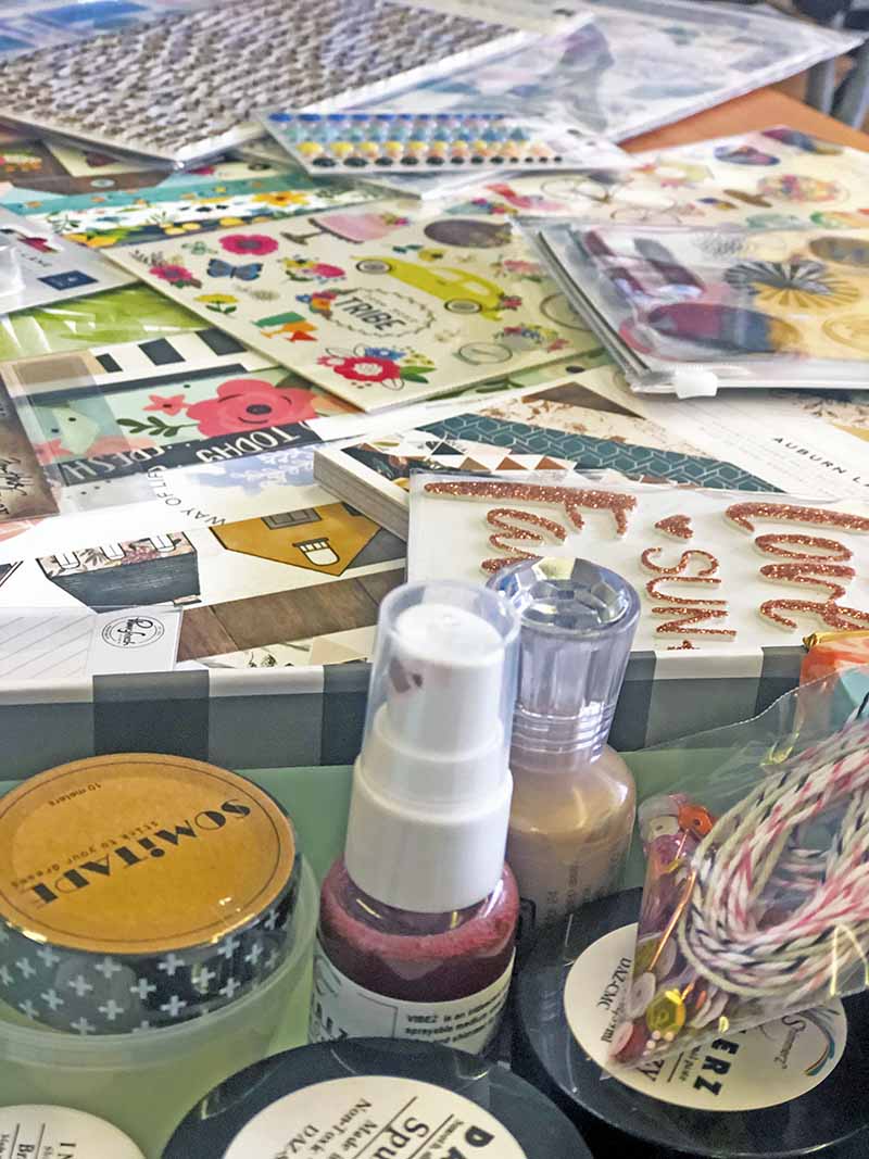 Photo of a range of scrapbooking embellishments and mixed media items
