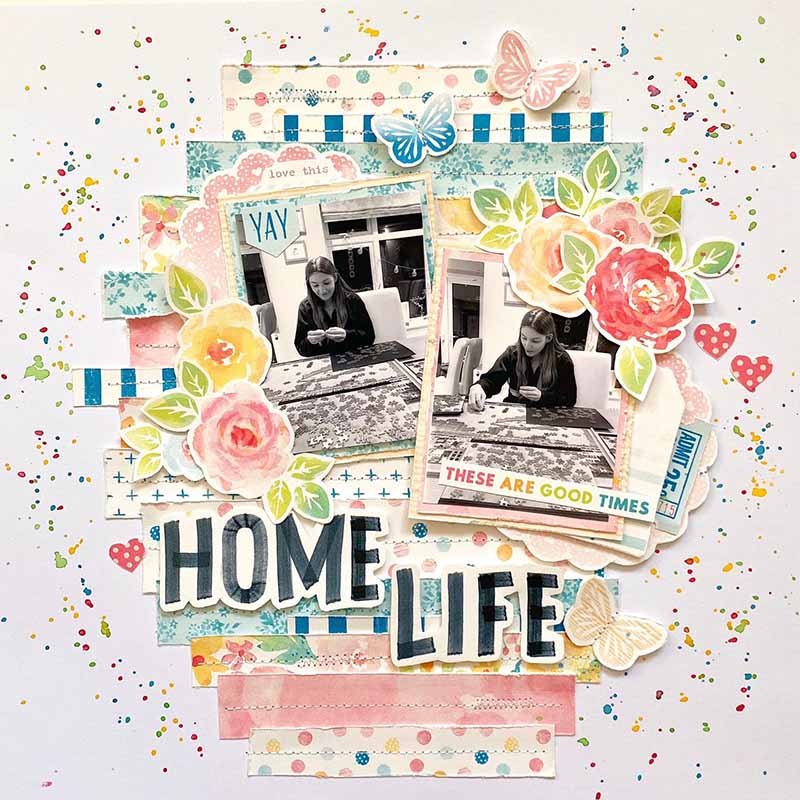Scrapbook page of home life playing a puzzle with butterflies and roses