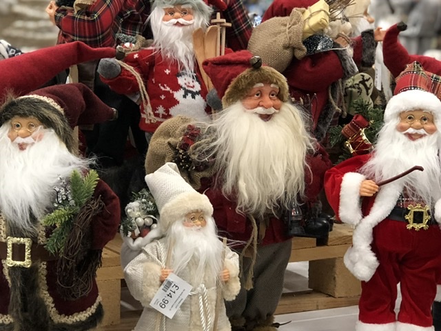 Lots of Santa decorations in a christmas shop in Essex