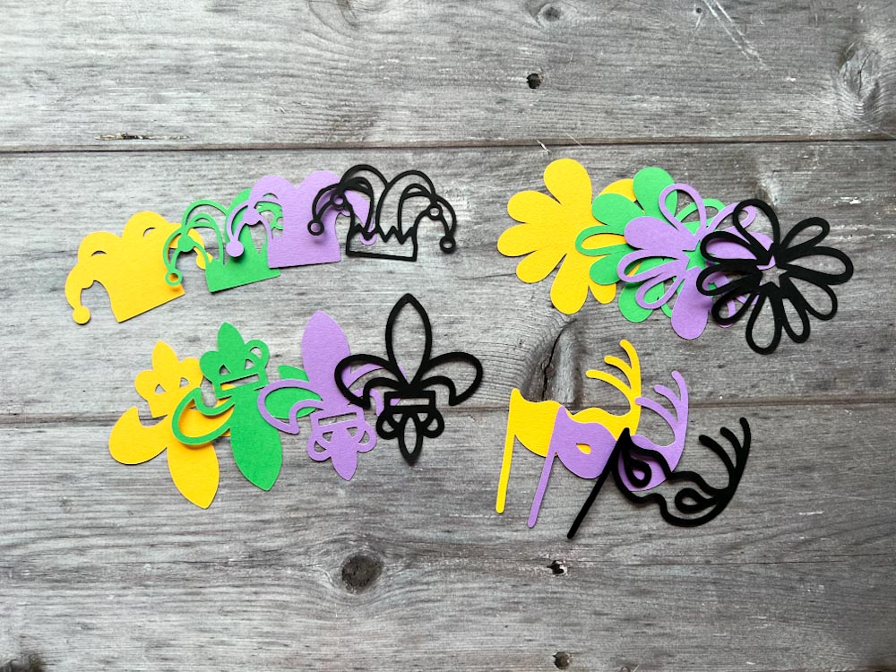 Free mini Layered Mardi Gras SVGs for card toppers and paper crafts