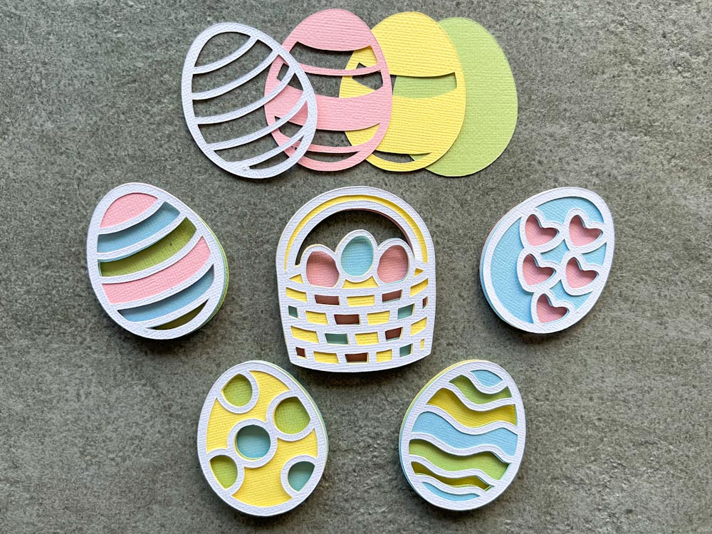 layered Easter Egg SVGs and layered  Easter basket svg are great for Easter crafts cut in pastel card