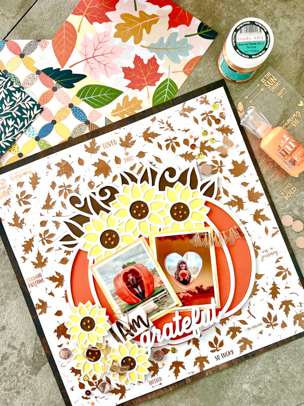 Layered Sunflower pumpkin SVG for card crafts and Cricut. Huge pumpkin floral detail on a scrapbooking page