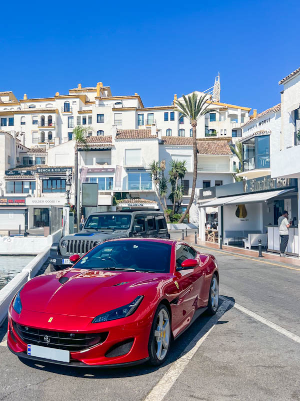 Ferrari Portafino parked outside outside Sinatras Puerto Banus