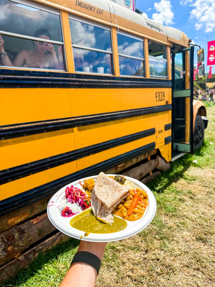 Glastonbury festival food Thali veggie curry on a school bus