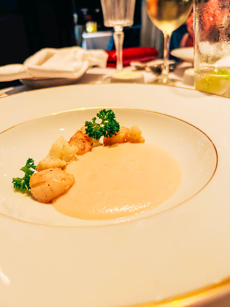 Scallops in Le Bistro on Norwegian Encore. Photo Credit Sarah Christie
