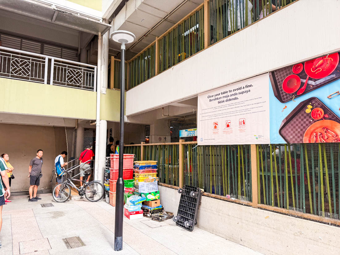 People queuing outside hawker centre