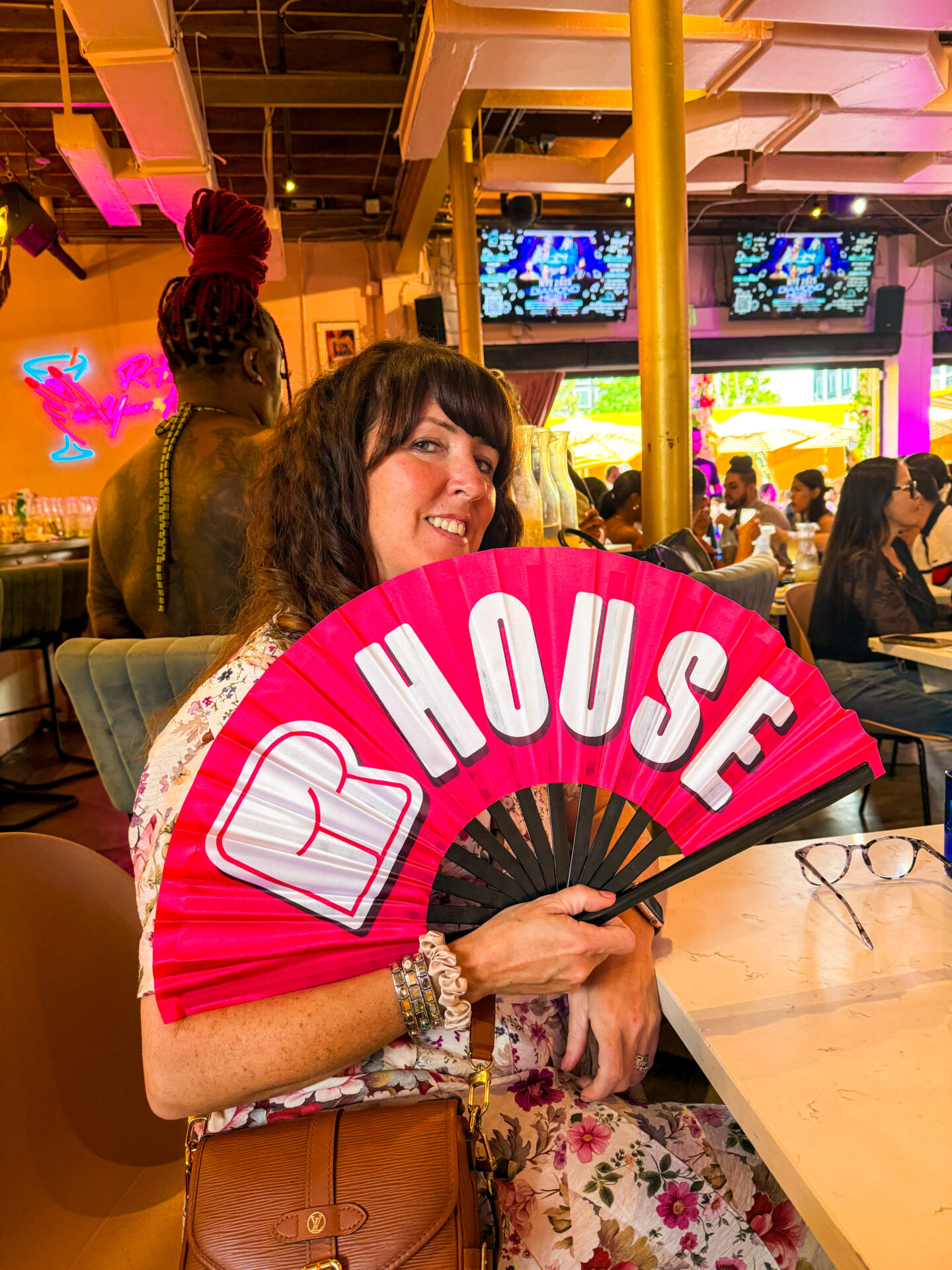 R House Miami Beach woman with the large fan