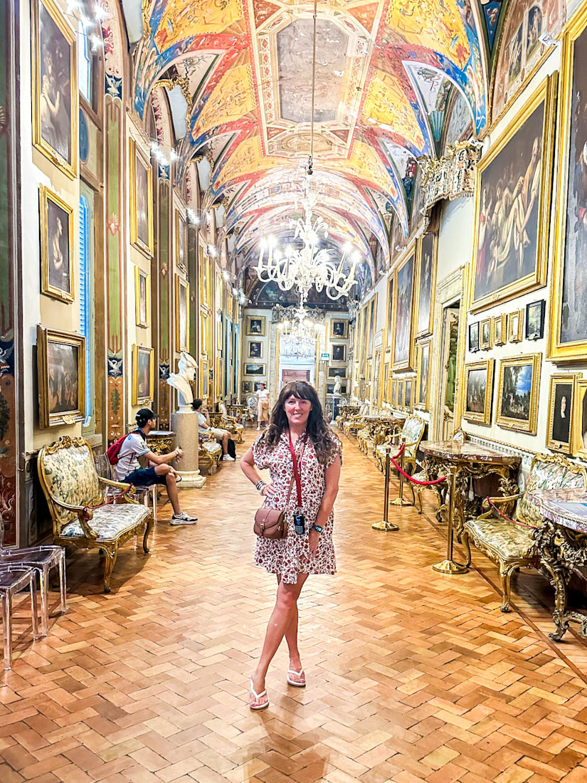 Galleria Doria Pamphilj, Rome, woman standing in the gallery.