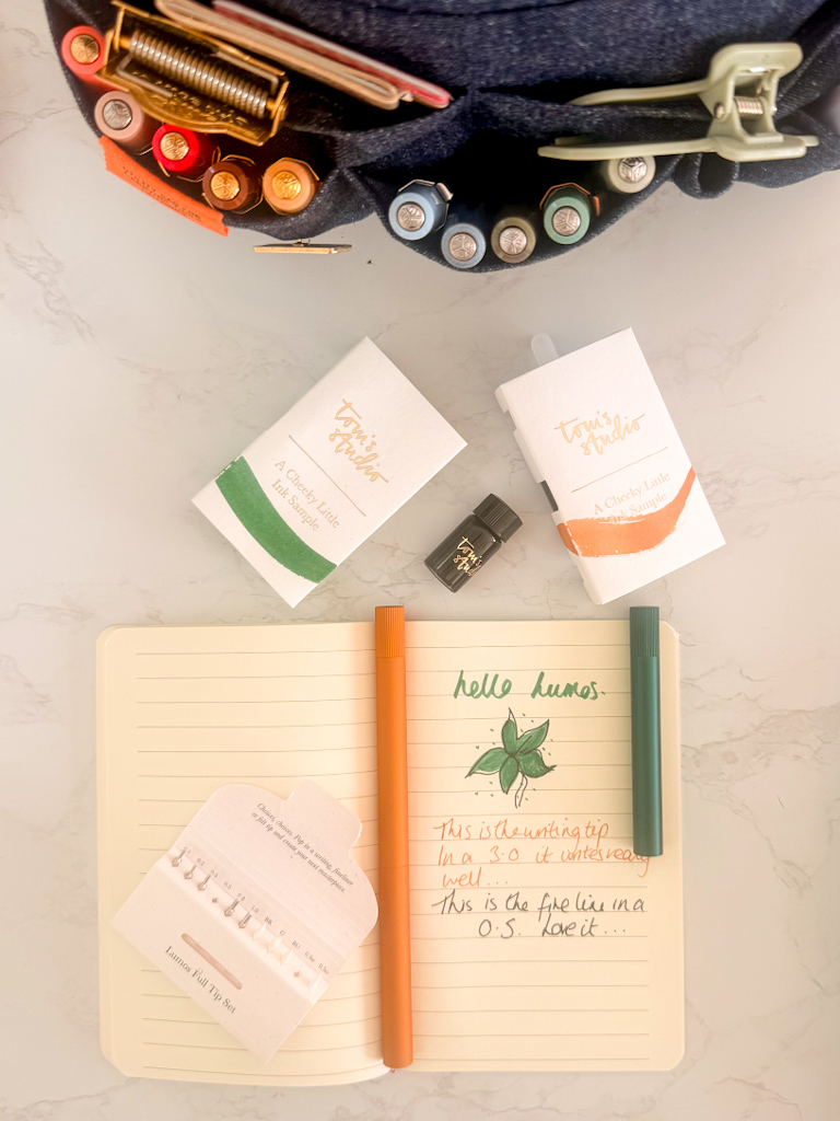 min lumos and lumos pen in Clementine for travel journalling 