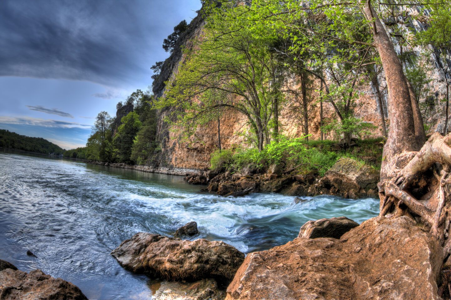 Lake of the Ozarks, A High Dynamic Range photo of a rushing natural spring flowing into the lake of the ozarks in Missouri.